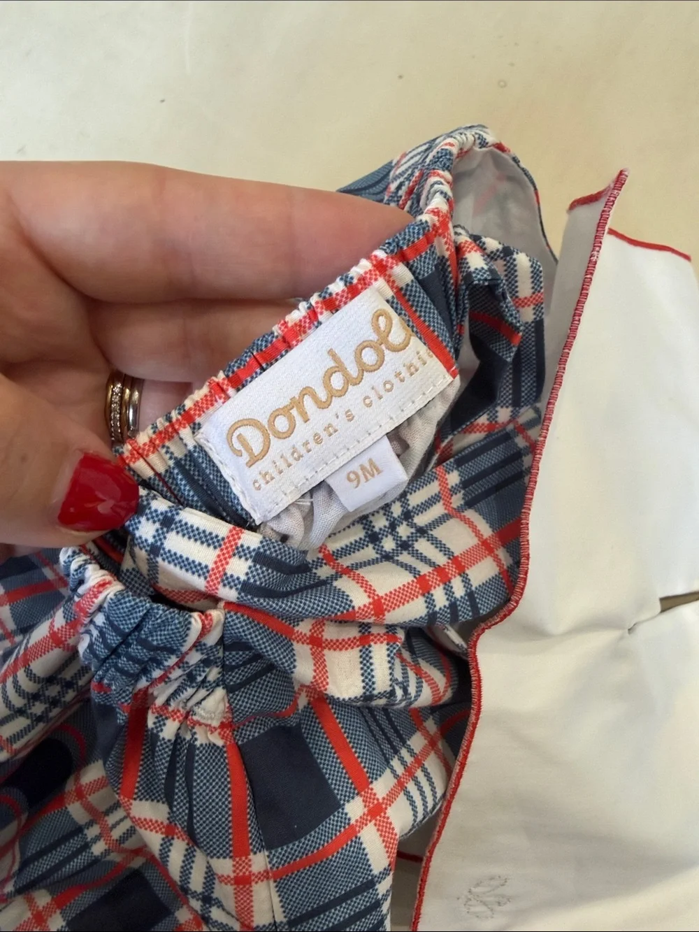 DONDOLO Personalized “TOMAS” Navy & Red Plaid Baby Romper with White Bib